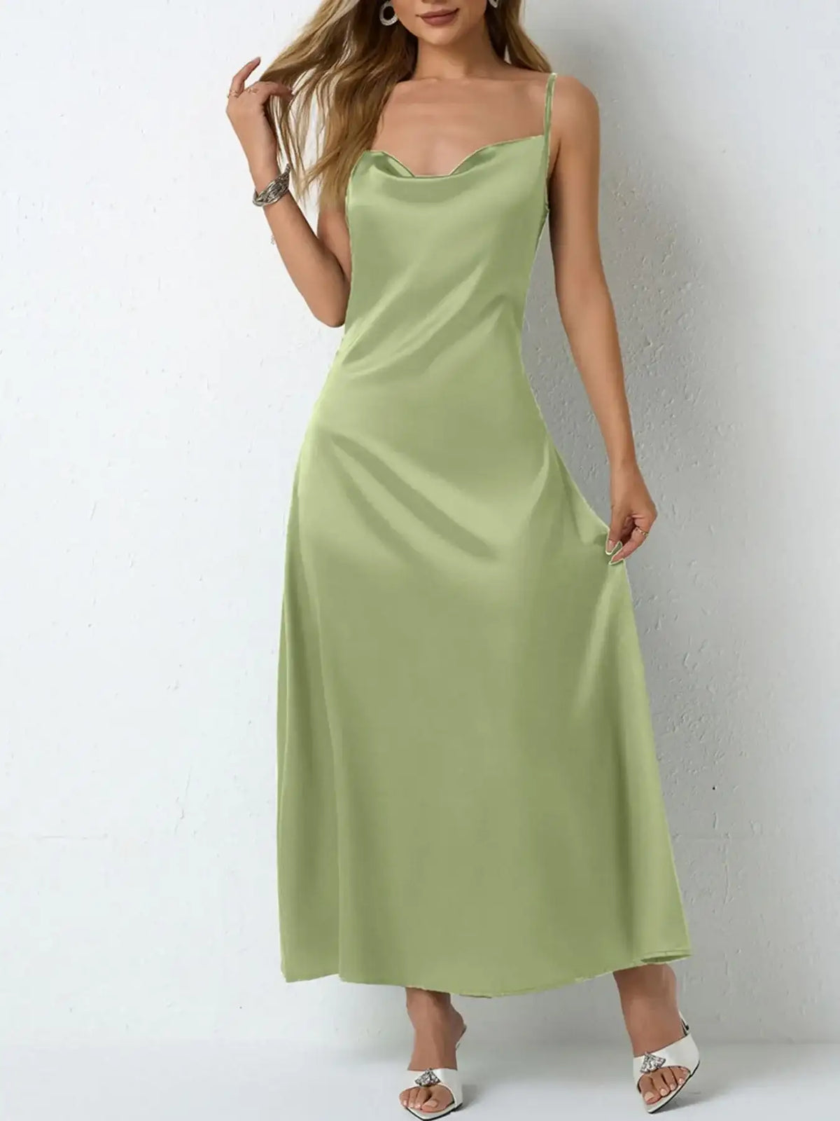 Sage green satin cowl neck slip maxi dress by Evie's Dreamland with thin straps and a flowy fit.