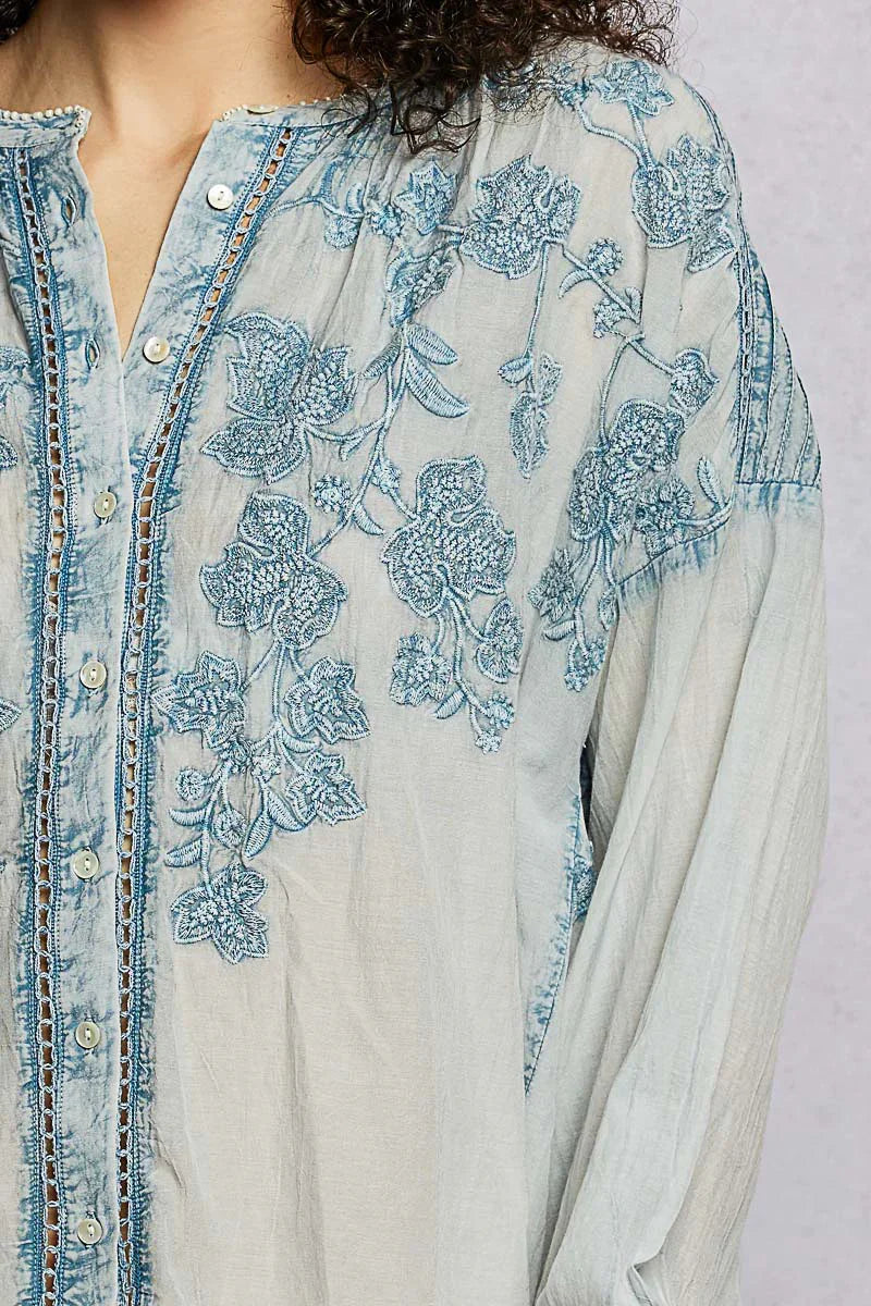 Light blue embroidered blouse with floral pattern and button-down front for women