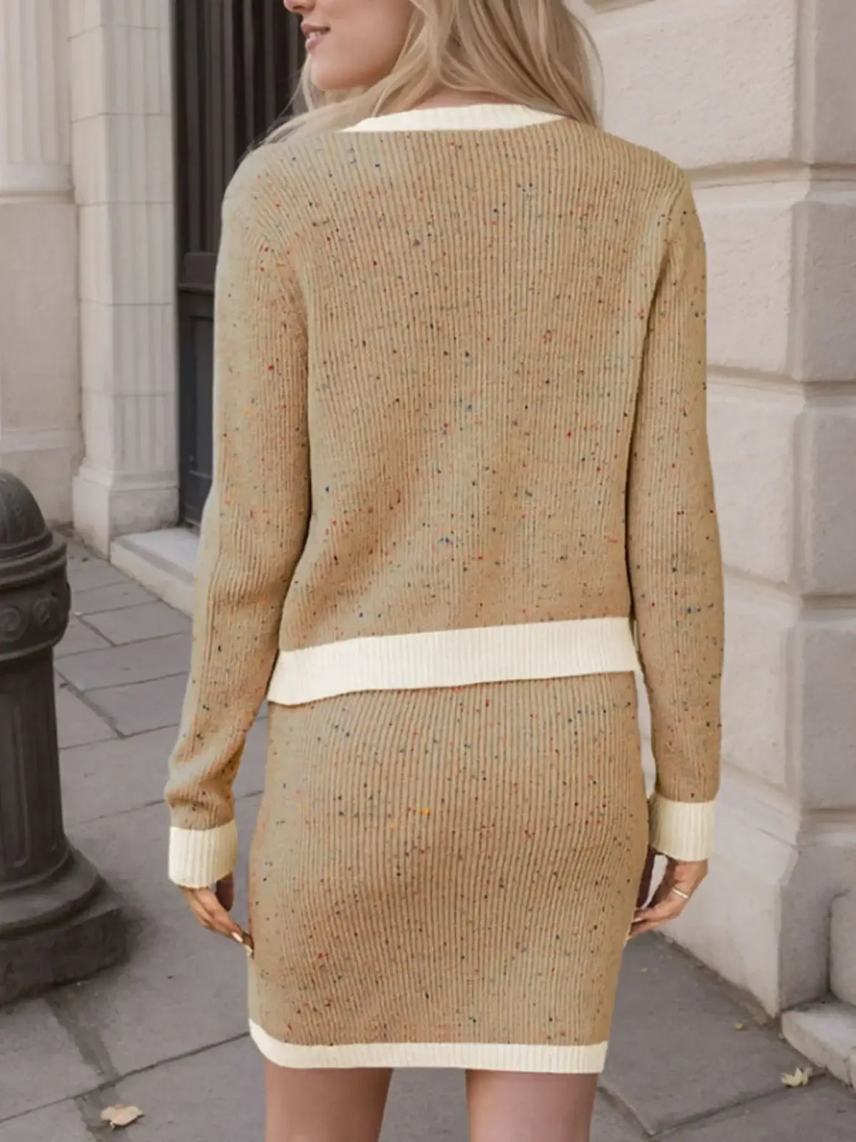 Back view of a tan ribbed sweater skirt set with contrast white trim by Evie's Dreamland.