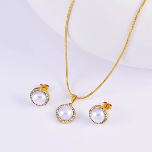 18K gold-plated Evie's Dreamland necklace and earrings set featuring white pearls and rhinestone halos.