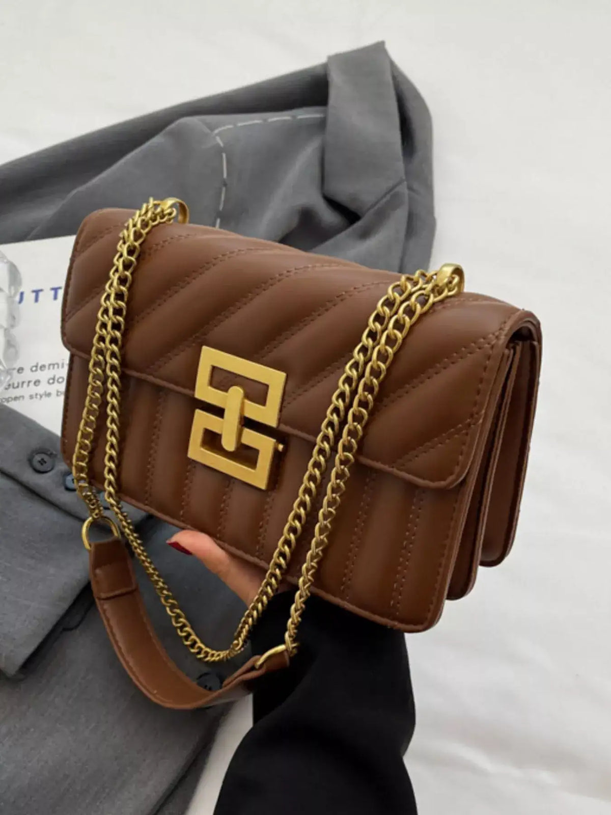Brown quilted PU leather flap shoulder bag with gold chain strap and clasp