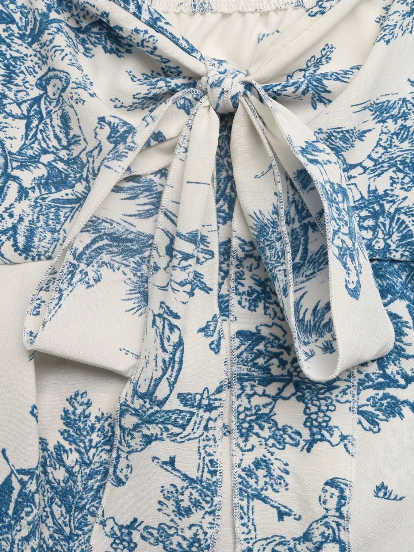 Blue floral ruffle-hem cami tank top, back view