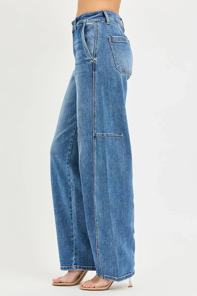 Wide leg blue denim jeans with side pockets, high waist, and contrast stitching