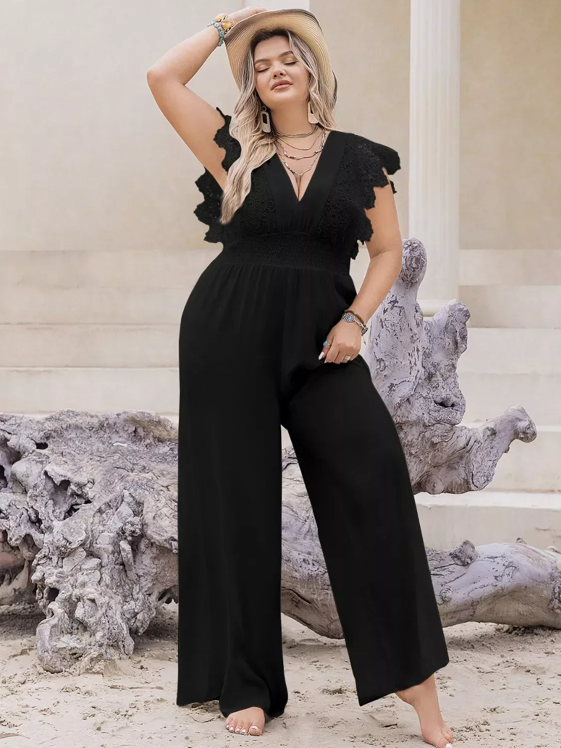 Plus size lace cap sleeve wide leg jumpsuit in elegant black for curvy women