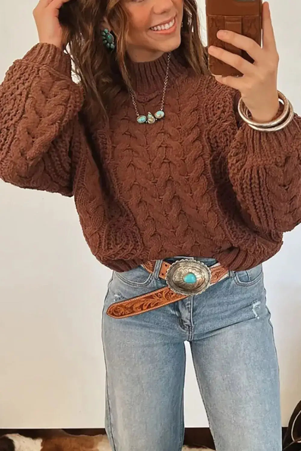 Brown women's cable knit sweater with mock neck
