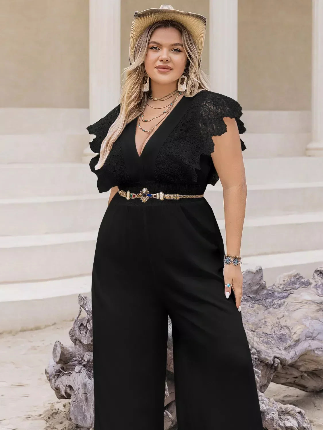 Plus size lace cap sleeve wide leg jumpsuit showcasing elegant curvy style in breathable viscose fabric