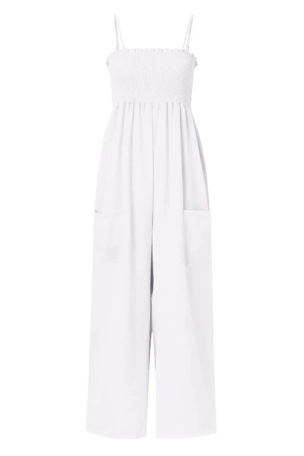 White sleeveless jumpsuit with smocked bodice, adjustable straps, wide legs, and front pockets