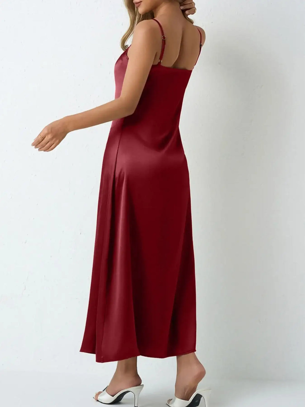 Back view of a burgundy satin cowl neck slip maxi dress by Evie's Dreamland with adjustable straps.