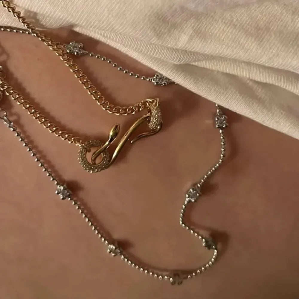 Gold-plated zircon necklace shown on model's neckline