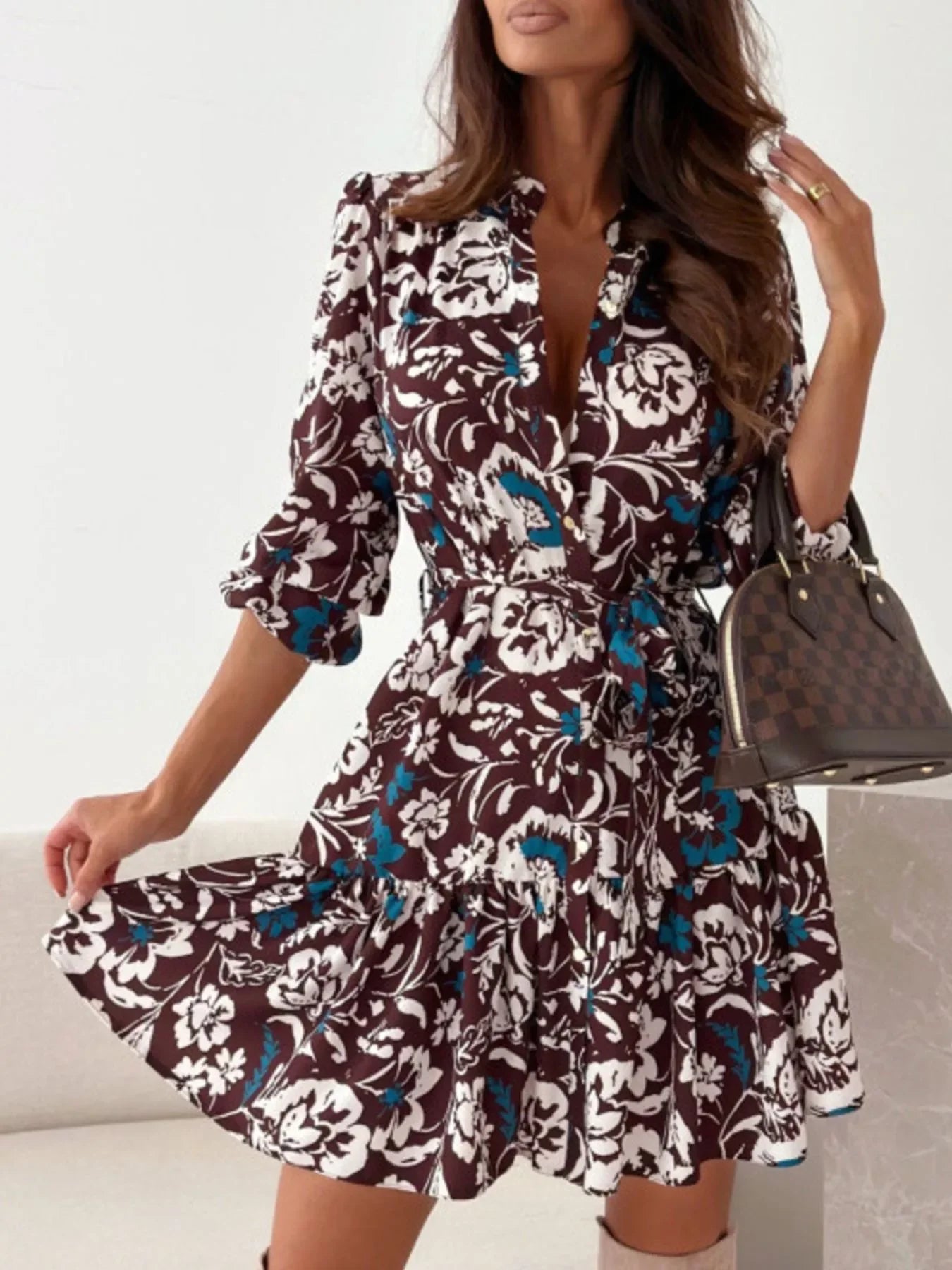 Floral tie-waist mini dress with ruffled hem and long sleeves