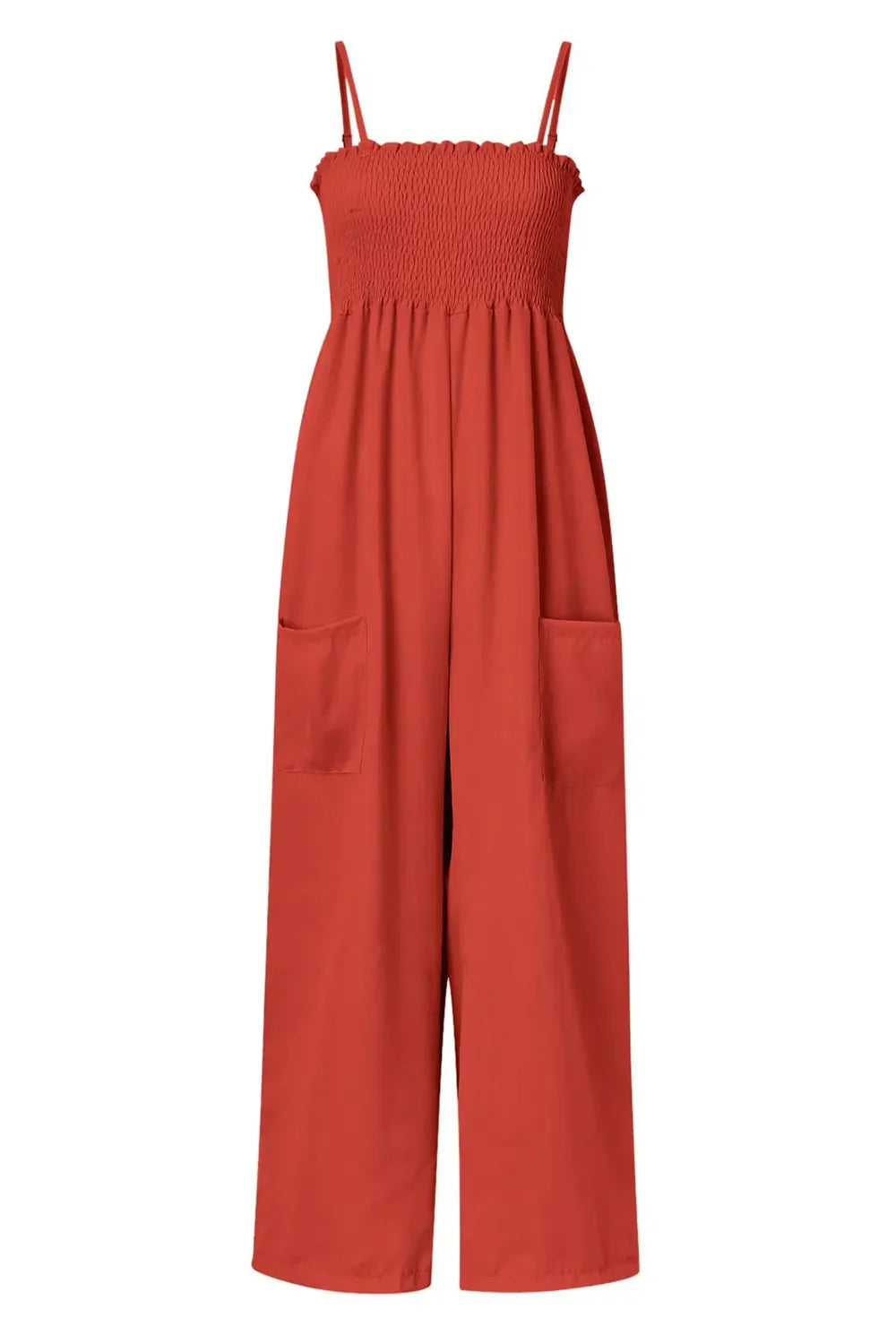 Red sleeveless jumpsuit with smocked bodice, wide legs, and front pockets on white background